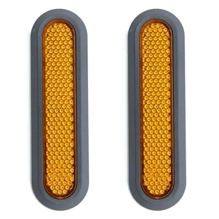 Dos catadióptricos naranjas para Xiaomi Mi4 con superficie reflectante y marco gris.